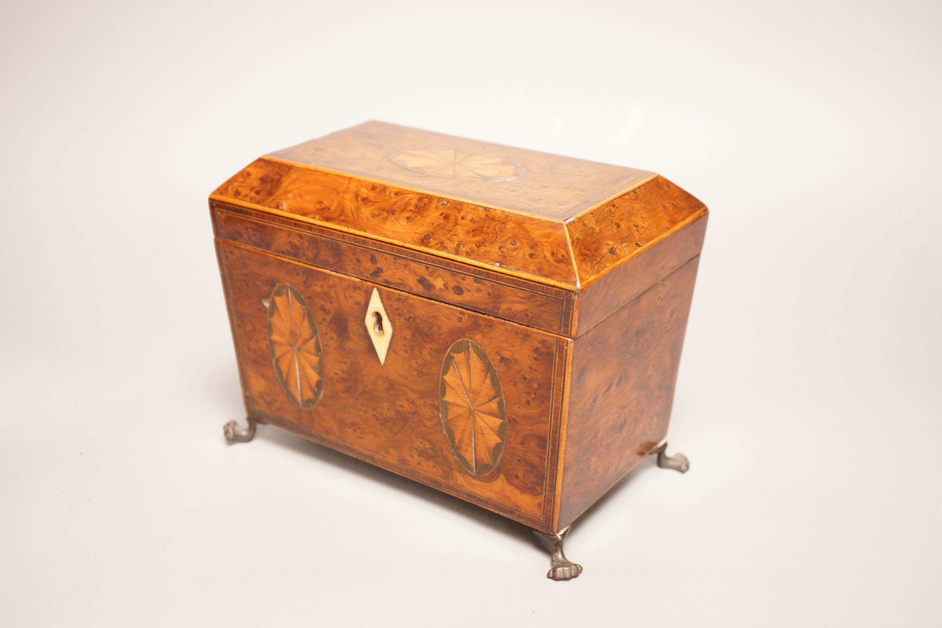 A Regency inlaid burr yew tea caddy, ivory escutcheon, 19cm foot to foot